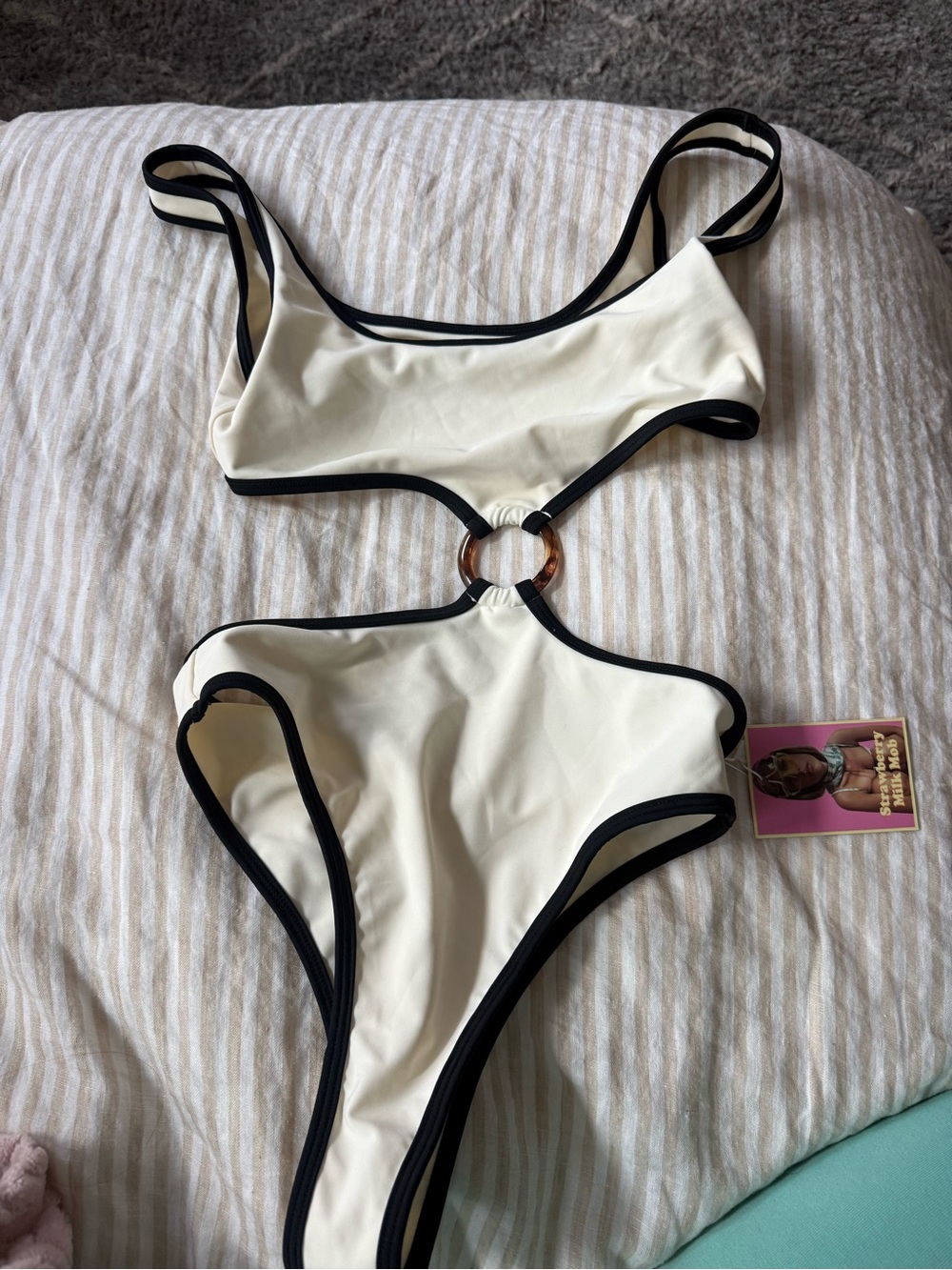 Strawberry milk mob white and black one piece new with tags never worn